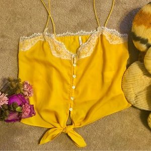 Lace, button up, tie front crop top in golden yellow.